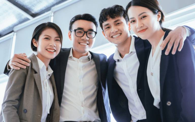 8 Tips to Unlock Your Career-Boosting Potential An image of a group of young professionals