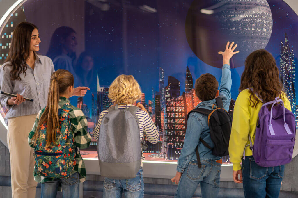 Image of a student group looking at an exhibit