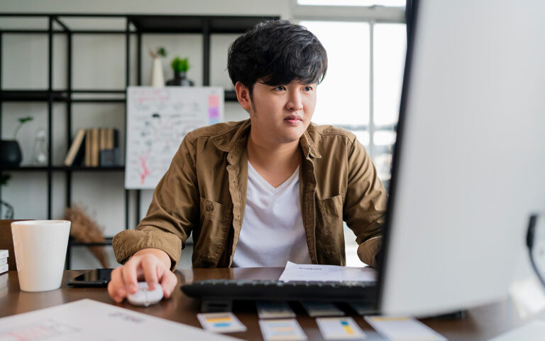 Dressing for the Job: How to Choose the Right Cold Wear in Singapore for Professional Use a person wearing a jacket inside a workplace