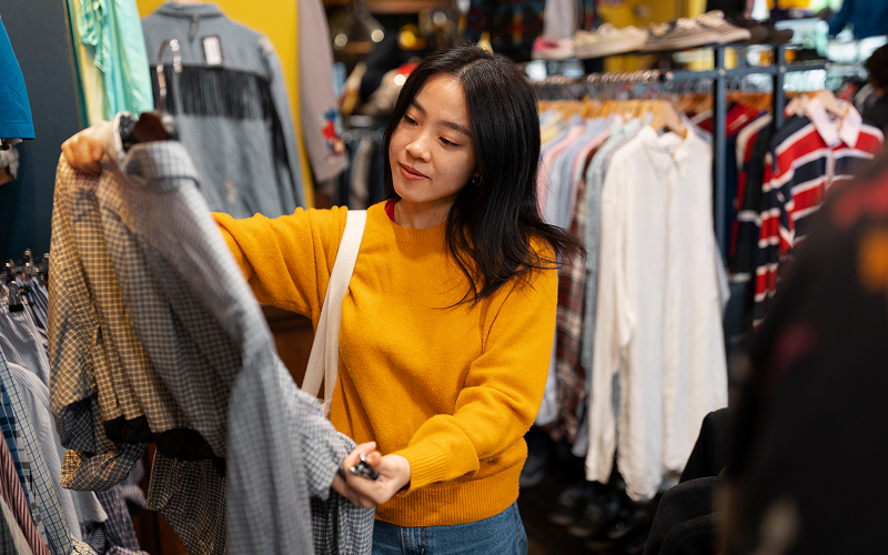 person buying a clothes or a clothing store