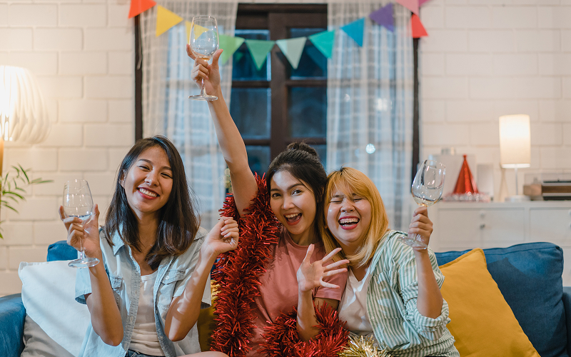 A group of people celebrating indoors.