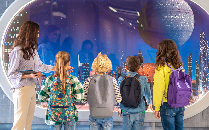 Children entering the Keppel Centre for Art Education, surrounded by colourful installations and interactive displays