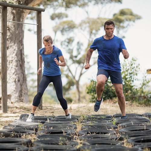 Small image of a family doing an obstacle course