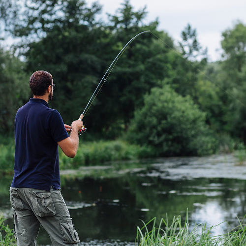 Small image of a person fishing