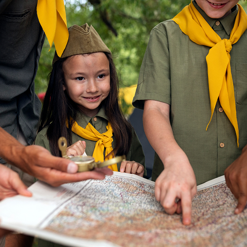 Small image of a family with a scavenger hunt map